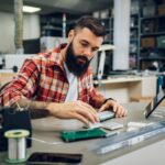 Electronics engineer working in a professional workshop